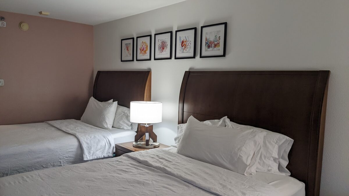 A picture of the queen beds at a guest room at Hilton Garden Inn Orlando at SeaWorld