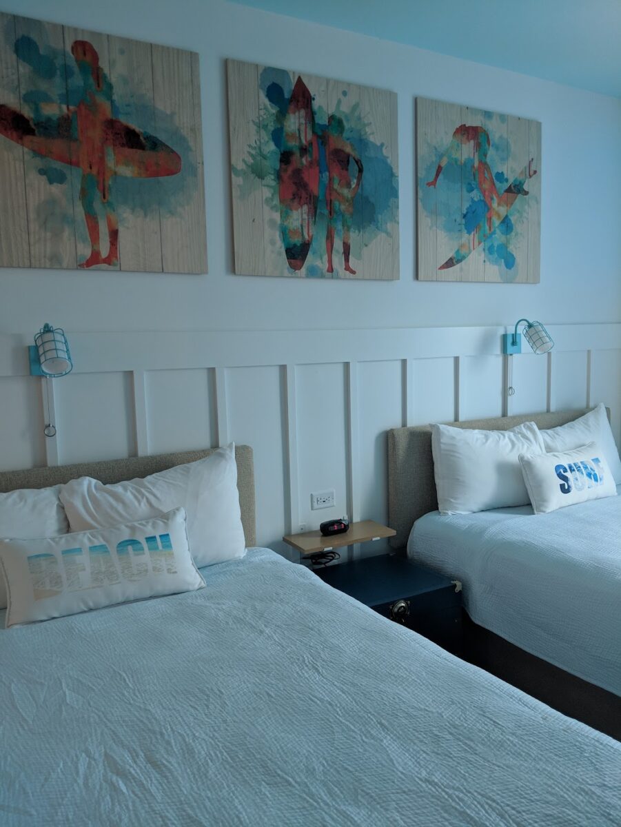 A picture of two guest beds in a two-bedroom suite at Surfside Inn at Universal Orlando