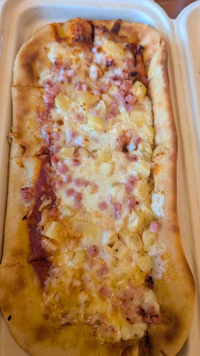 A picture of a Hawaiian pizza at Captain Cook's at Disney's Polynesian Resort in Orlando, Florida