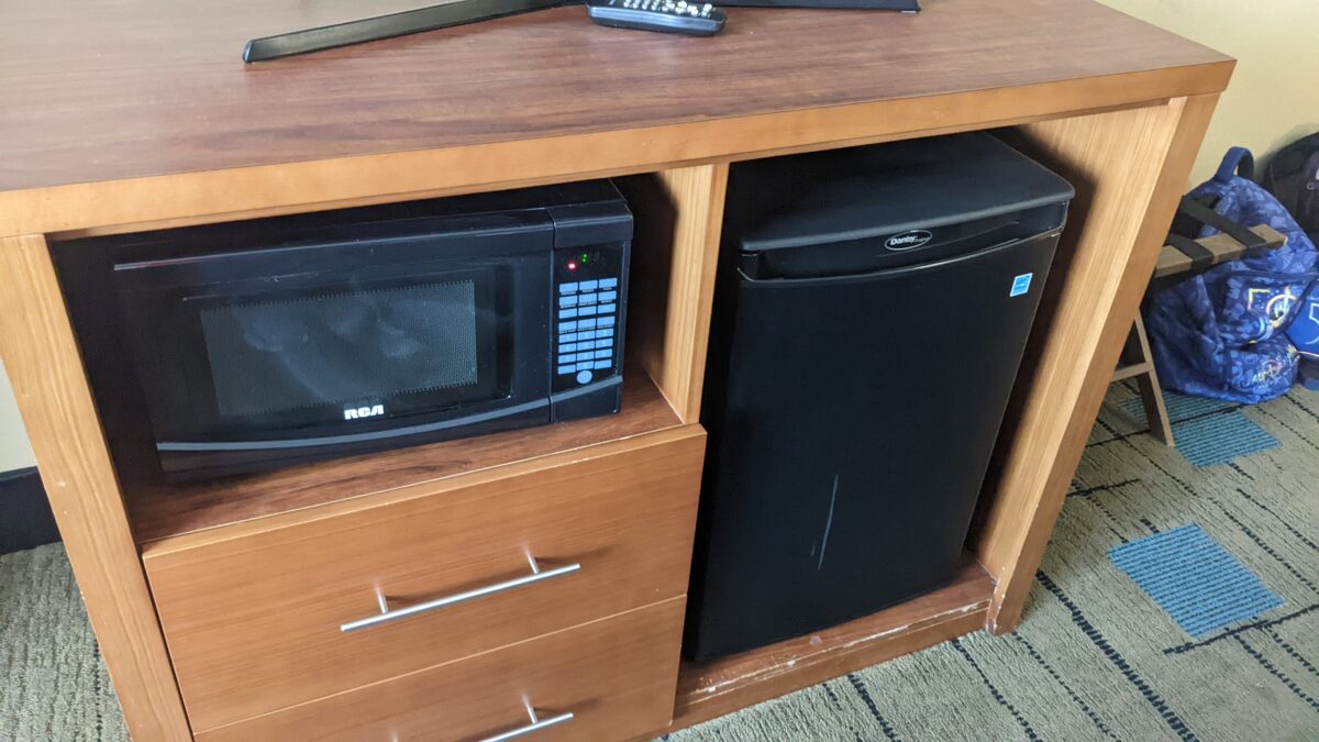 A picture of the small refrigerator and microwave in the guest rooms at Comfort Suites near MCAS Beaufort SC