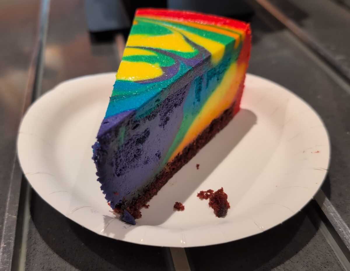 A picture of a slice of tie-dyed cheesecake at Disney's Pop Century Resort.