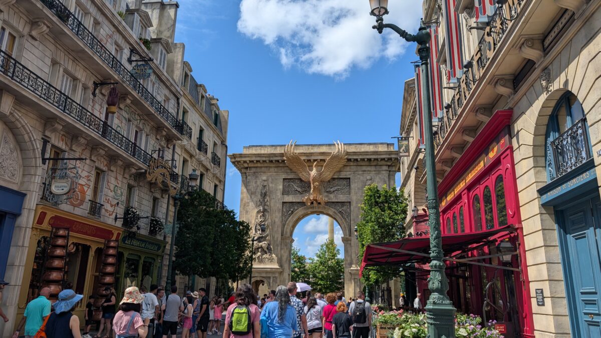 Phoenix Arch and streetway in the Wizarding World of Harry Potter Ministry of Magic at Epic Universe