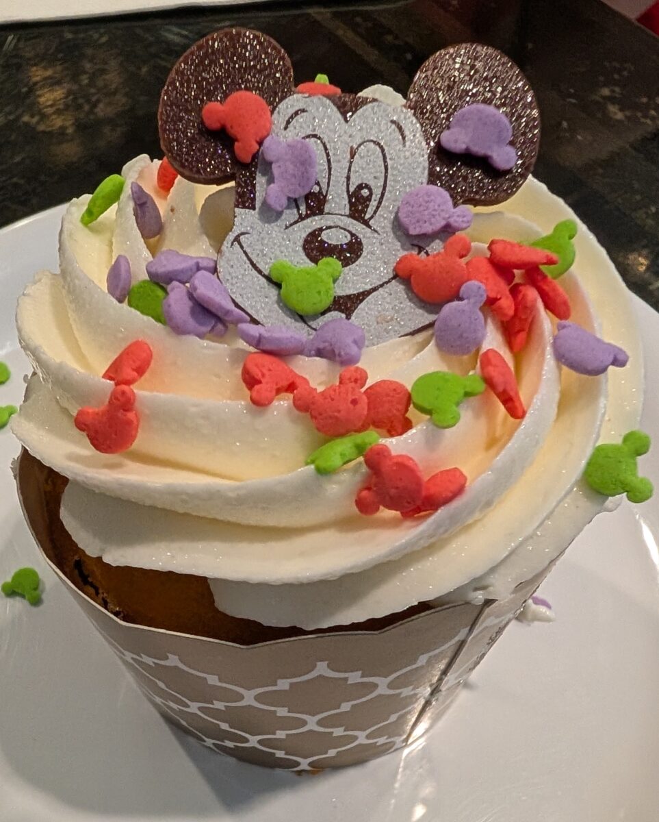 A picture of a Mickey Mouse cupcake I got for my birthday from Hollywood and Vine's Minnie's Holiday Dine at DIsney World.