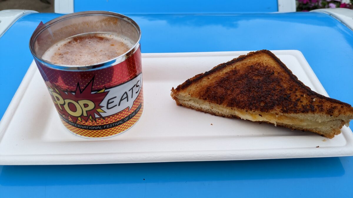 A picture of a grilled cheese sandwich with tomato soup from Epcot's Festival of the Arts in Disney World.