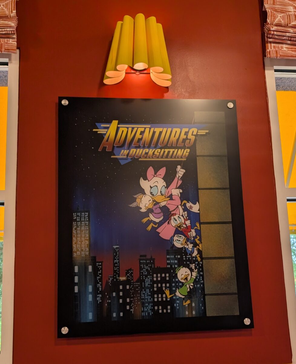 I love the parody poster Adventures in Ducksitting, a spoof on Adventures in Baby-Sitting, at Disney's All Star Movies hotel's World Premiere Food Court