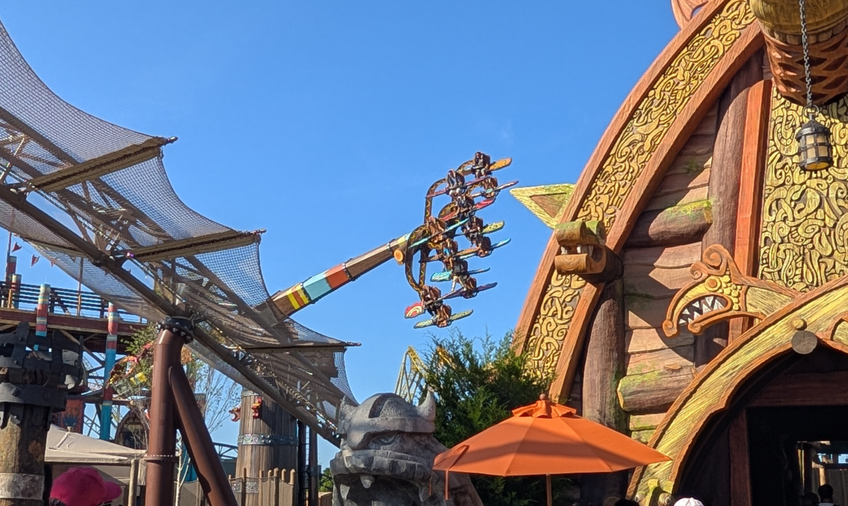 Dragon Racer's Rally Ride in air at Isle of Berk in Epic Universe park