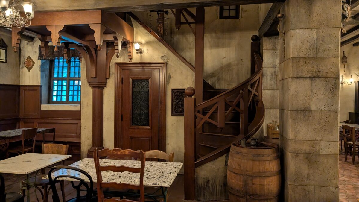 A room inside Le Gobelet Noir restaurant in the Wizarding World of Harry Potter Ministry of Magic section of Epic Universe