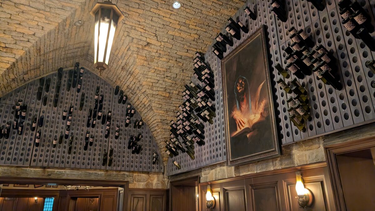 A painting of a dark wizard inside Le Gobelet Noir restaurant in Epic Universe