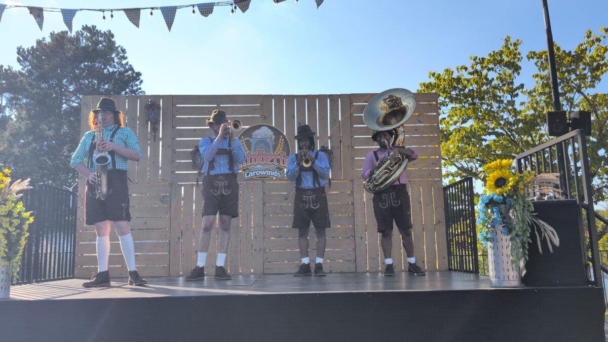 A band performing live Oktoberfest music at Carowinds theme park in Charlotte NC