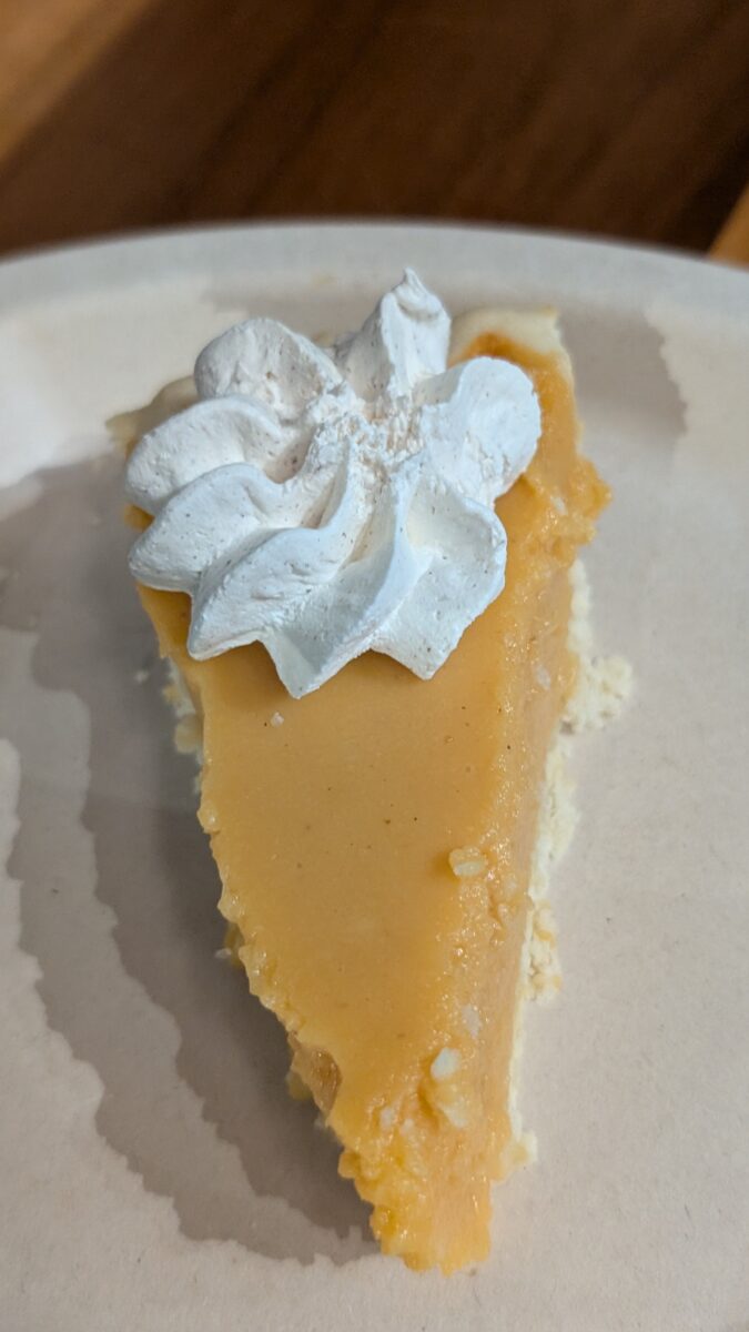 A picture of a slice of sweet potato pie from SeaWorld Orlando's Christmas Celebration.