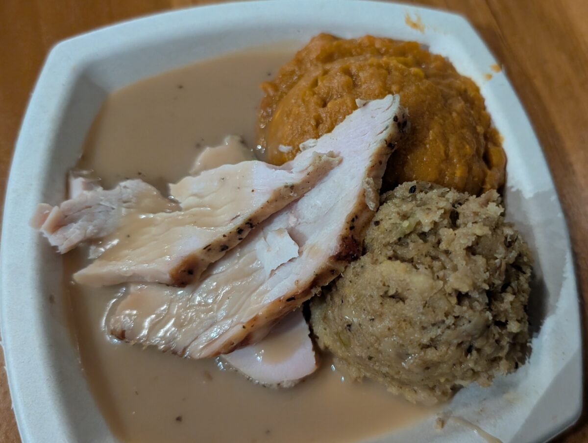 A picture of the roasted turkey from SeaWorld Orlando's Christmas Celebration, which comes with stuffing, gravy, and mashed sweet potatoes.