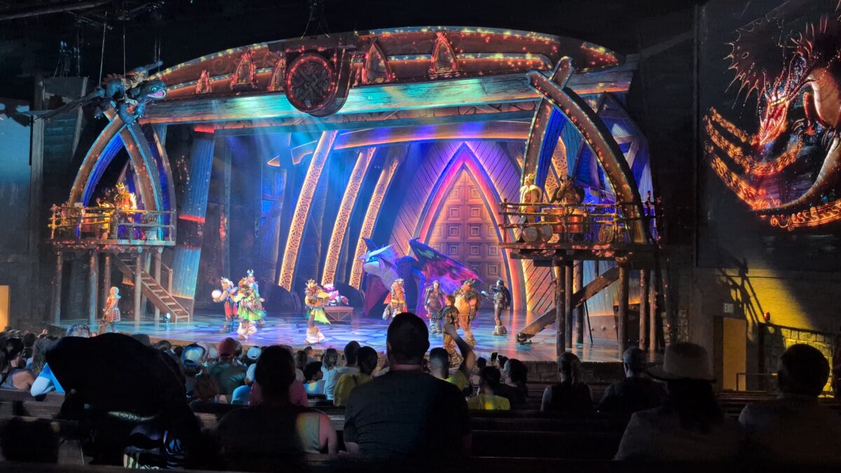 Performers onstage during a production of The Untrainable Dragon at the Isle of Berk in Epic Universe park in Orlando, Florida